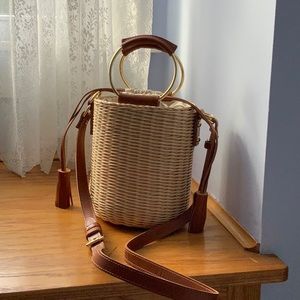 Thacker wicker and leather bucket bag